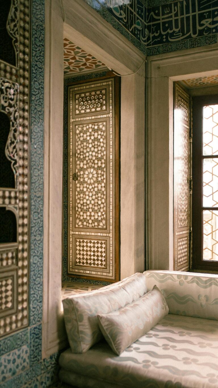 Elegant room with traditional Ottoman decor and intricate window designs in Istanbul.